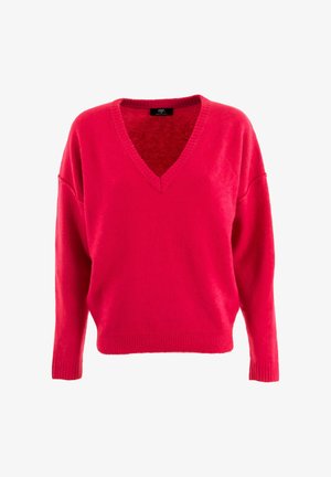 Pull oversized en V, de couleur rose vif, fabriqué en tricot doux. Features des poignets et un ourlet côtelés, avec des épaules légèrement tombantes.