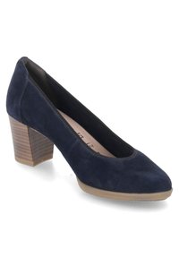 Scarpa con tacco alto in suede blu navy, punta arrotondata, tacco in legno texturizzato e suola liscia color marrone chiaro. Design minimalista senza decorazioni.