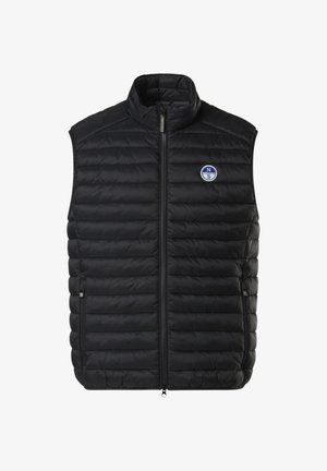 Schwarzige gepolsterte Weste mit hohem Kragen und vorderem Reißverschluss. Verfügt über zwei seitliche Taschen und ein rundes Logo-Patch auf der Brust.