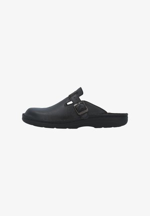 Zoccolo slip-on in pelle nera con cinturino regolabile con fibbia e suola imbottita, progettato per il comfort e l'uso casual.