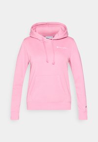 Ροζ φούτερ με κουκούλα από απαλό ύφασμα. Διαθέτει τσέπη μπροστά, κουκούλα με κορδόνι και μανσέτες με ρίγες. Λογότυπο εμφανίζεται στο στήθος.