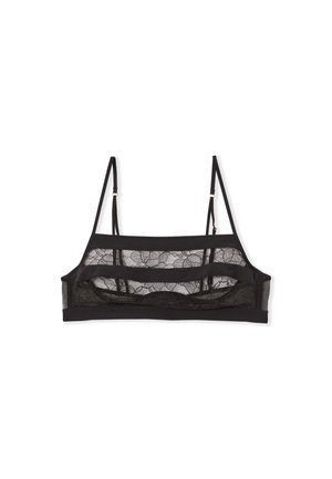 Zwarte bralette met een kanten overlay, voorzien van doorschijnende panelen en verstelbare banden. Gestructureerd ontwerp met een brede band en minimale hardware.