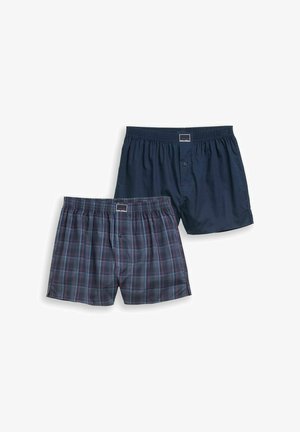 Kaks paari meeste bokserpükse, üks ühevärviline tumesinine ja teine tumesinine halli ning punase ruudulise mustriga, mõlemad elastse vöökohaga ja nööpidega ees.