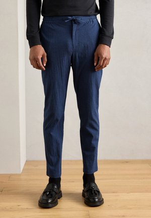 FINCH TAPERED FIT - Trousers - sky captain
