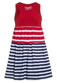 Punainen toppimekko, jossa on leveä helma. Yläosa on vuorotellen punaisia ja valkoisia raitoja, ja alaosa on tummansinisiä ja valkoisia vaakaraidoilla.