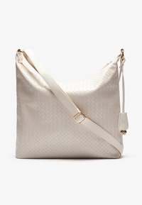 Woven beige handbag with a smooth texture, a single adjustable strap, and gold-tone hardware accents. Features a zip closure.