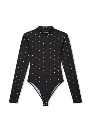 Body nero a maniche lunghe con pois bianchi, colletto alto e chiusura a pressione sul fondo. Realizzato in tessuto elasticizzato per un aspetto aderente.