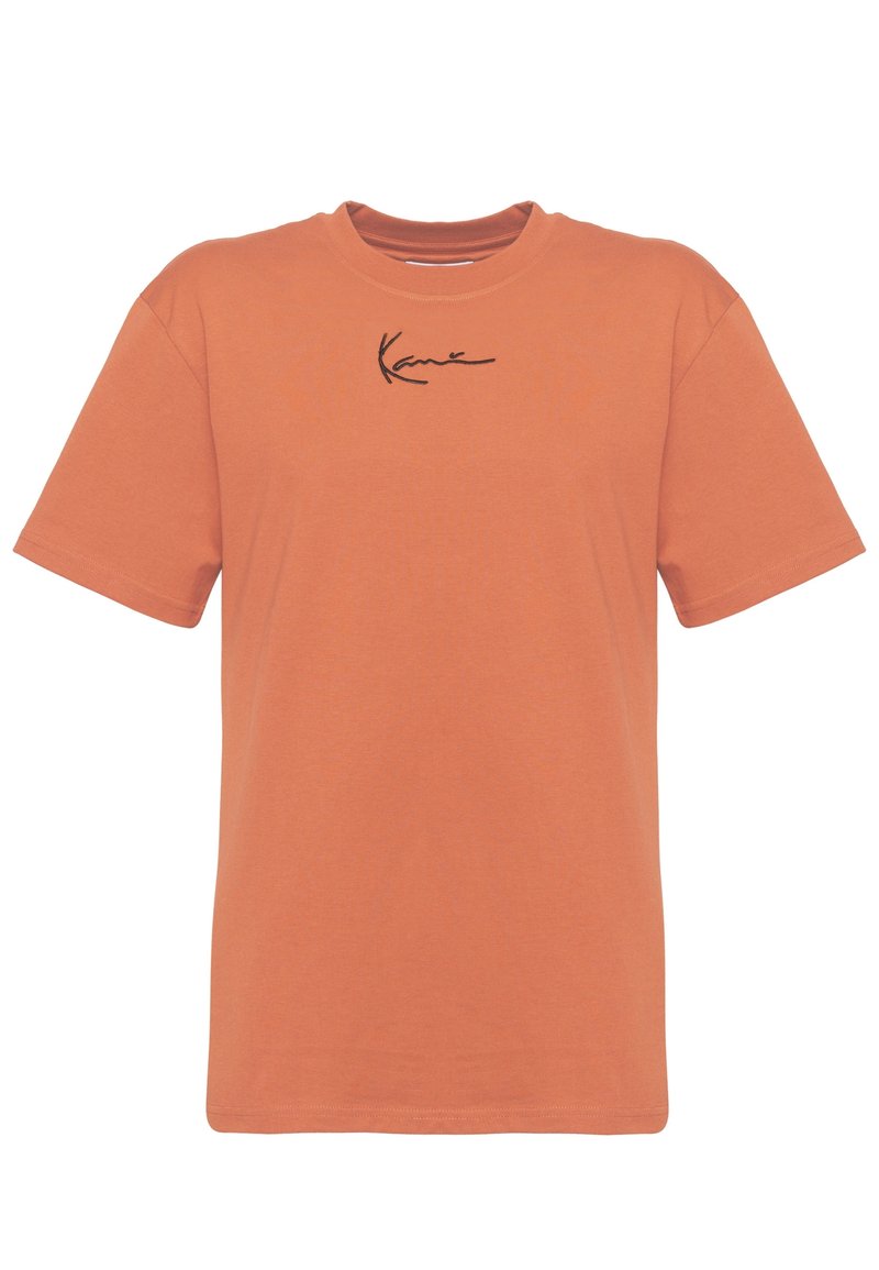 T-shirt in cotone arancione con maniche corte, dotata di un logo signature nero sul petto. Collo rotondo e vestibilità standard.
