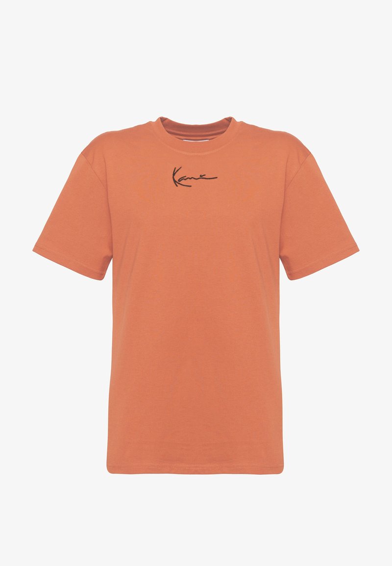 T-shirt in cotone arancione con maniche corte, dotata di un logo signature nero sul petto. Collo rotondo e vestibilità standard.