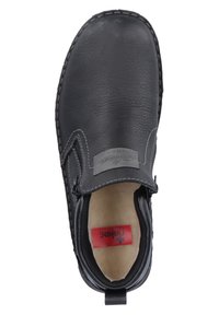 Mustapocketti nahkakengät, joissa on tekstuuripinta, erottuva stitchaus ja pehmeä sisävuori. Kengässä on myös etiketti sisällä.