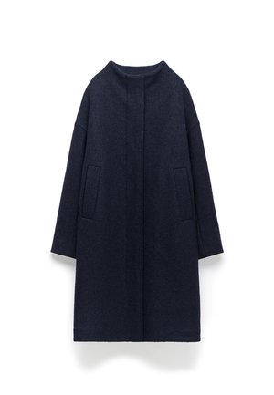 Navy wool blend coat with a high collar, dropped shoulders, and two front pockets. Features a straight-cut design and soft texture.