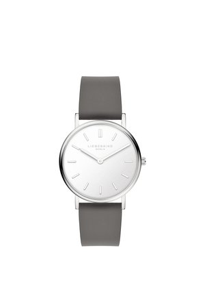 Minimalistische Armbanduhr mit weißem rundem Zifferblatt, silbernem Gehäuse, grauem Lederarmband und einfachen Stundenmarkierungen mit zwei silbernen Zeigern.
