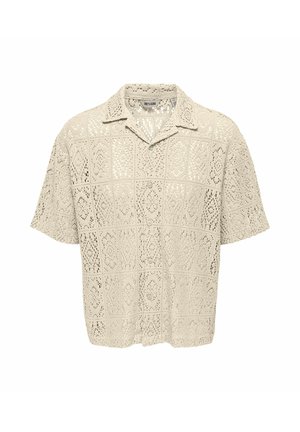 Camicia beige a maniche corte con bottoni, motivo a maglia aperta e colletto classico, tessuto leggero e semitrasparente.