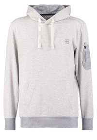 Sweat à capuche gris clair avec poche kangourou à l'avant, capuche à cordon réglable, poignets et ourlet côtelés, et poche zippée sur la manche gauche.