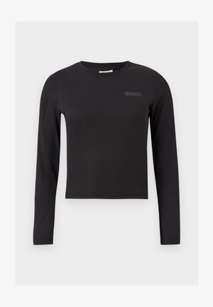 Melnā garām piedurknēm crop top blūze, izgatavota no elastīga auduma, ar apaļu kakla izgriezumu un mazu logotipu drukātu uz krūtīm.