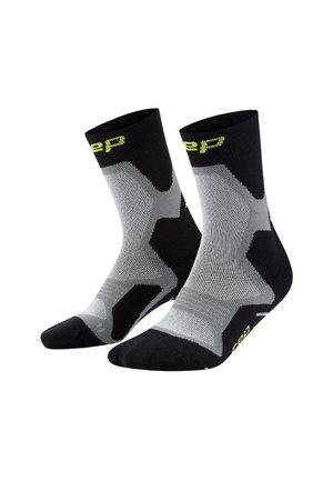 RUN COMPRESSION CUSHION MID CUT UNISEX - Chaussettes de sport - black