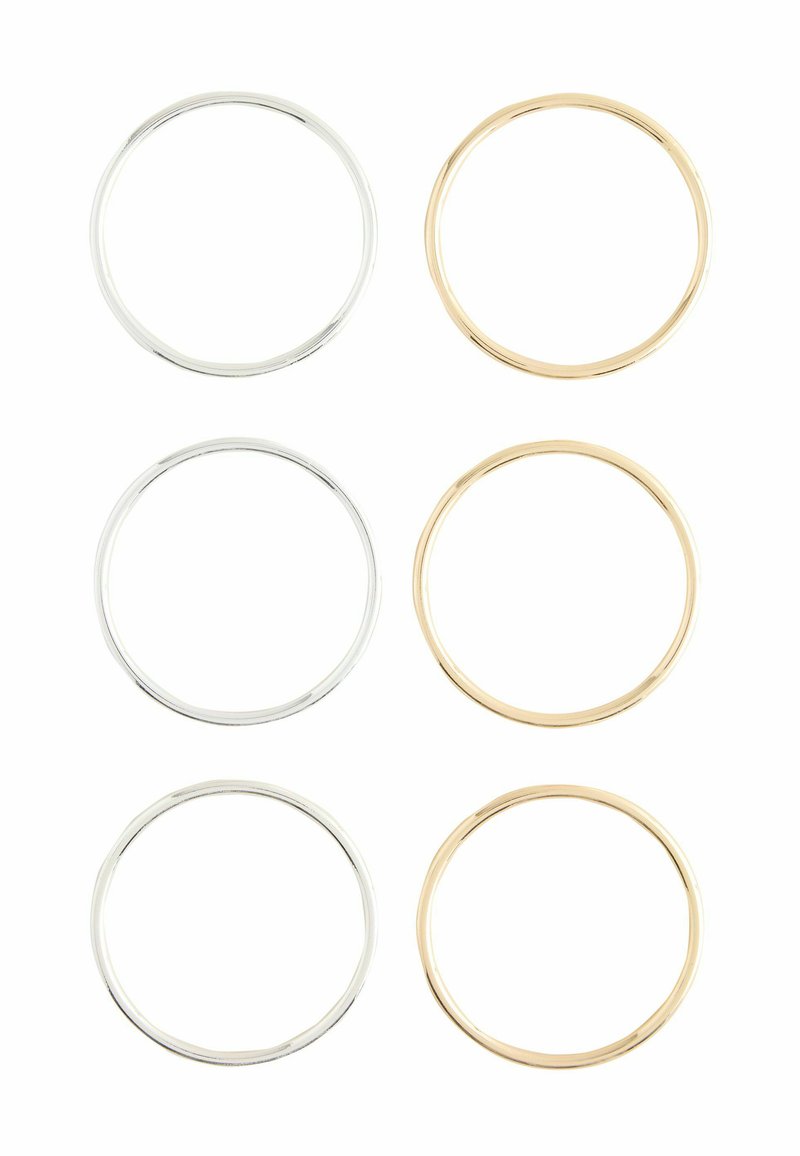 Kuue rõnga komplekt: kolm hõbedast ja kolm kuldset. Iga rõngas on sile ja ringsa, läikiva pinnaga, mille paksus varieerub õrnalt.