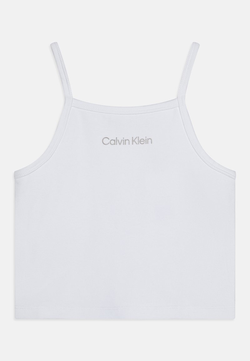 Valge puuvillane singi top õhuke rihmadega. Esiküljel on väike hall "Calvin Klein" logo, kujundus on ühtlane ja sobivus on kitsas.