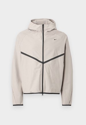 Nike Sportswear, M NK TECH SHORI KNIT WR FZ JKT - Trainingsjacke - college grey/black