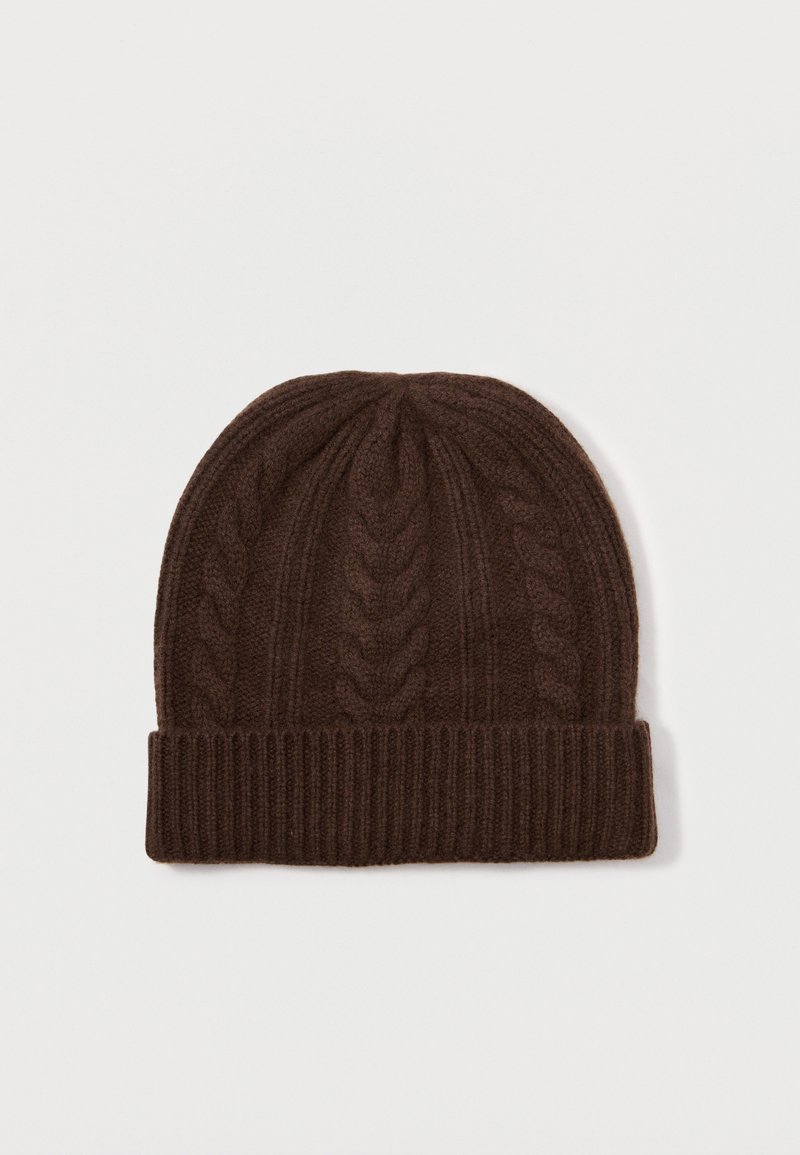 Dark brown knitted beanie with braided cable pattern and folded ribbed brim, laid flat on a white background.