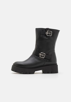 KRIS - Platform ankle boots - black