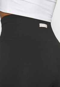Björn Borg STUDIO SEAMLESS LIGHT - Trikoot - black beauty
