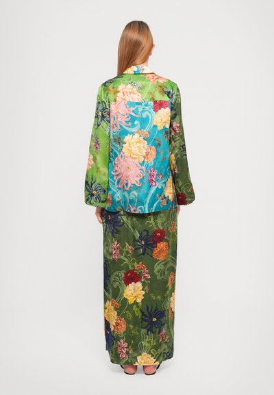 Multicolored floral print silk kimono with long sleeves and matching skirt. Green, blue, and pink hues with intricate patterns. Smooth texture.