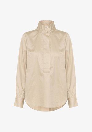 Beige, long-sleeve shirt with a high collar, front half-placket, and rounded hem. Smooth fabric with minimal texture and no visible patterns.