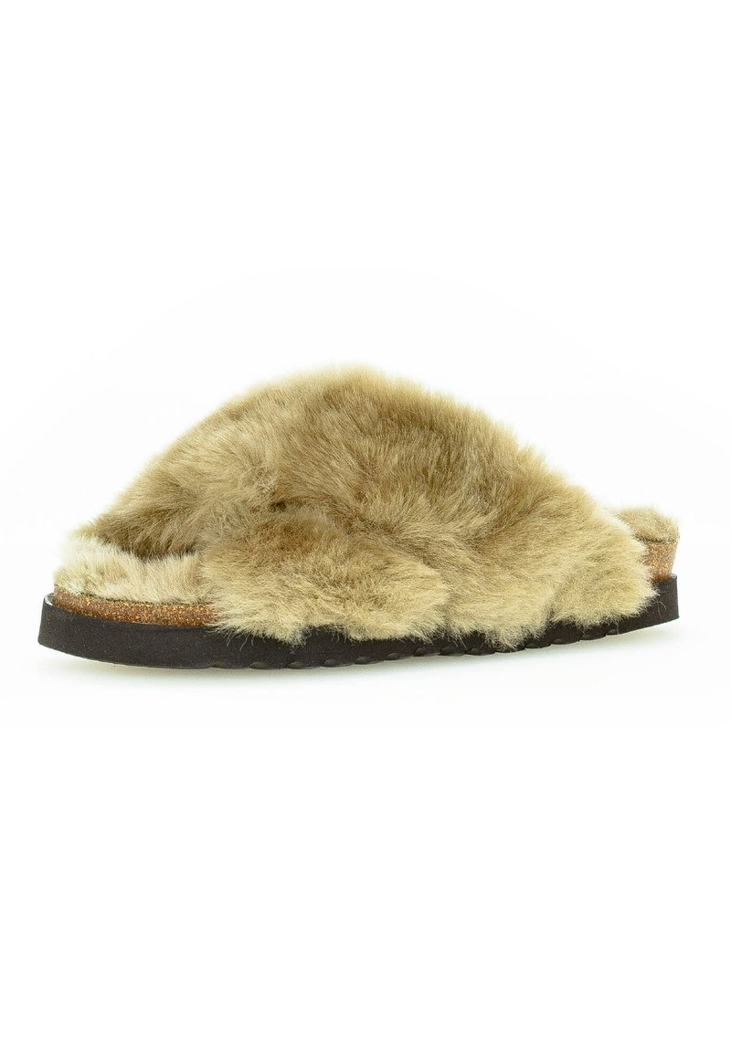 Furry beige slide sandal with a wide, soft upper and a cork footbed. Features a textured rubber sole for grip.
