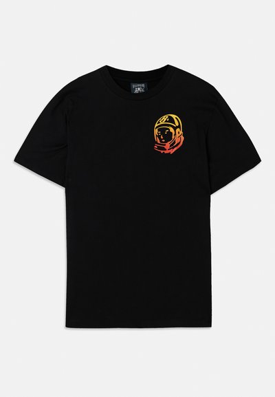 Black cotton t-shirt featuring a colorful astronaut graphic on the left chest. Classic crew neck and short sleeves. Soft texture.