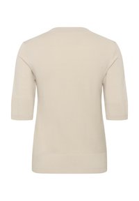 Pull en tricot beige à manches courtes avec poignets, ourlet et encolure ras du cou côtelés, vu de dos.