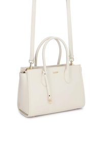 Τσάντα χειρός εκρού με σταθερή δομή, διπλές λαβές, αποσπώμενο ιμάντα ώμου και μικρό χρυσό λογότυπο του brand στο μπροστινό μέρος.