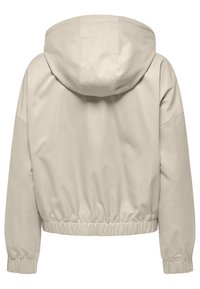 Beige cropped jacket with a hood, featuring elastic hems and smooth, matte texture. Simple design with no visible fasteners or embellishments.