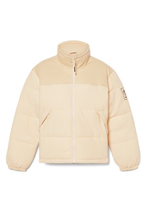 Puffjacke in hellbeige, mit hohem Kragen, weichem Material, vorderem Reißverschluss und elastischen Bündchen, sowie einer kontrastierenden Paneel über der Brust.