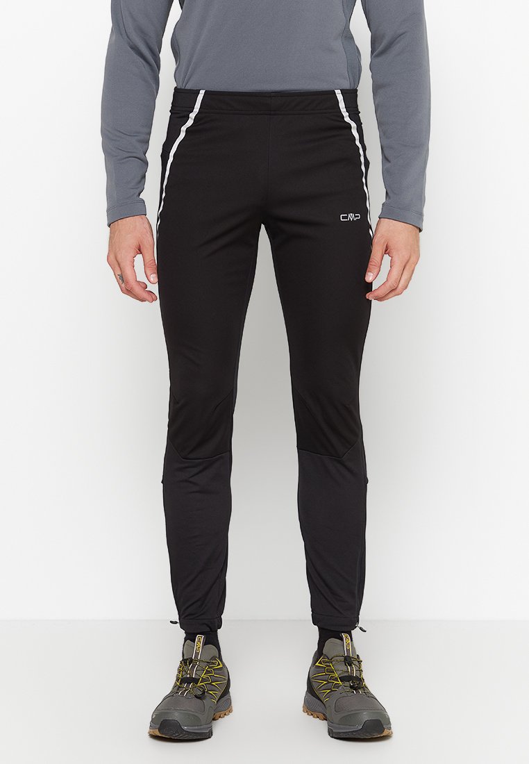 Pantaloni sportivi neri con un design aderente, caratterizzati da strisce laterali bianche, realizzati in un materiale elastico, con una texture liscia e gambe affusolate.