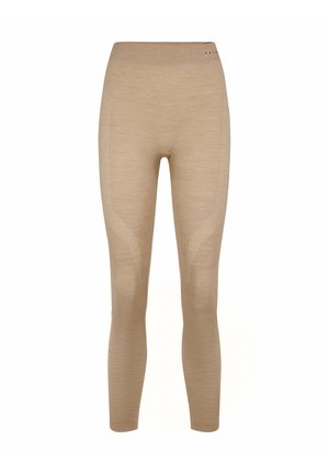 Beige naadloze legging met subtiele geribde patronen op dijen en kuiten, hoge tailleband en enkellange pasvorm.