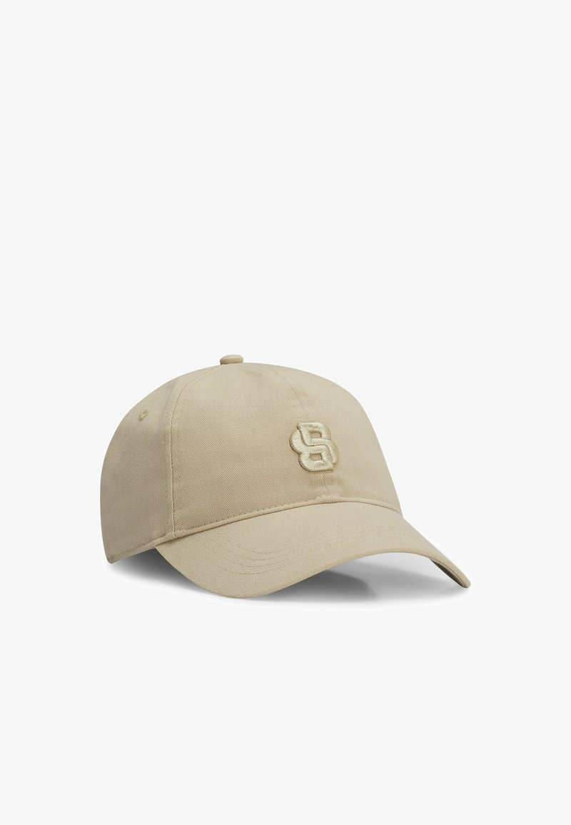 Cappellino da baseball beige in cotone, con corona rotonda e visiera curva. Logo ricamato sulla parte anteriore in una tonalità più chiara.