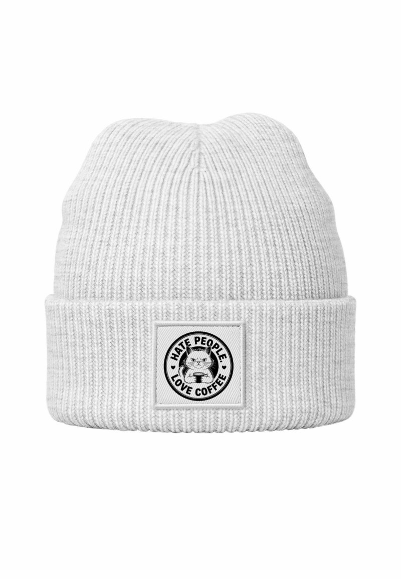 White knitted beanie with ribbed texture, featuring a fold-up brim. Front patch displays a cat graphic with the text "HATE PEOPLE LOVE COFFEE."