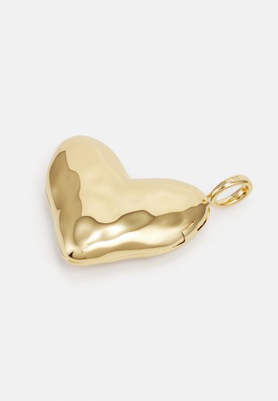 Gold heart-shaped locket with a polished surface. Features a hinge for opening and a loop for attachment. Smooth, reflective texture.