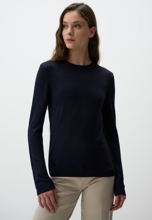 Navy blue long-sleeve sweater with a crew neckline, made of soft fabric; features ribbed cuffs and a slim fit silhouette.