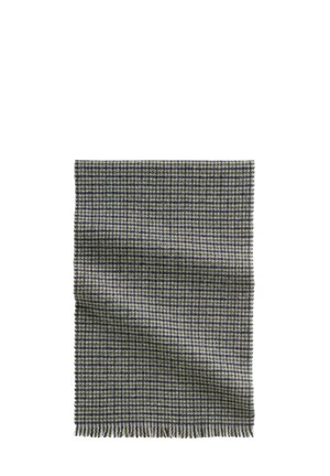 Gewebe-Wurfdecke in einem gelb und marineblauen Hahnentrittmuster. Mit fransenbesetzten Kanten und einer weichen Textur. Rechteckige Form.