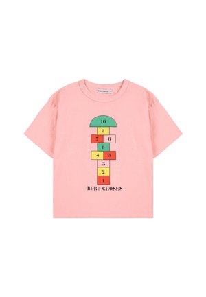 Pink cotton T-shirt with short sleeves, featuring a hopscotch graphic and the text "BOBO CHOSES" in black at the bottom.