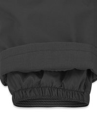 Schwarzer Jackenärmel mit einem verstellbaren inneren Bündchen, das aus elastischem und geripptem Stoff besteht, für einen sicheren Sitz.