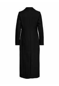 Black, long coat with a tailored design, featuring a notched collar, long sleeves, and a mid-calf length. Smooth texture with minimal details.