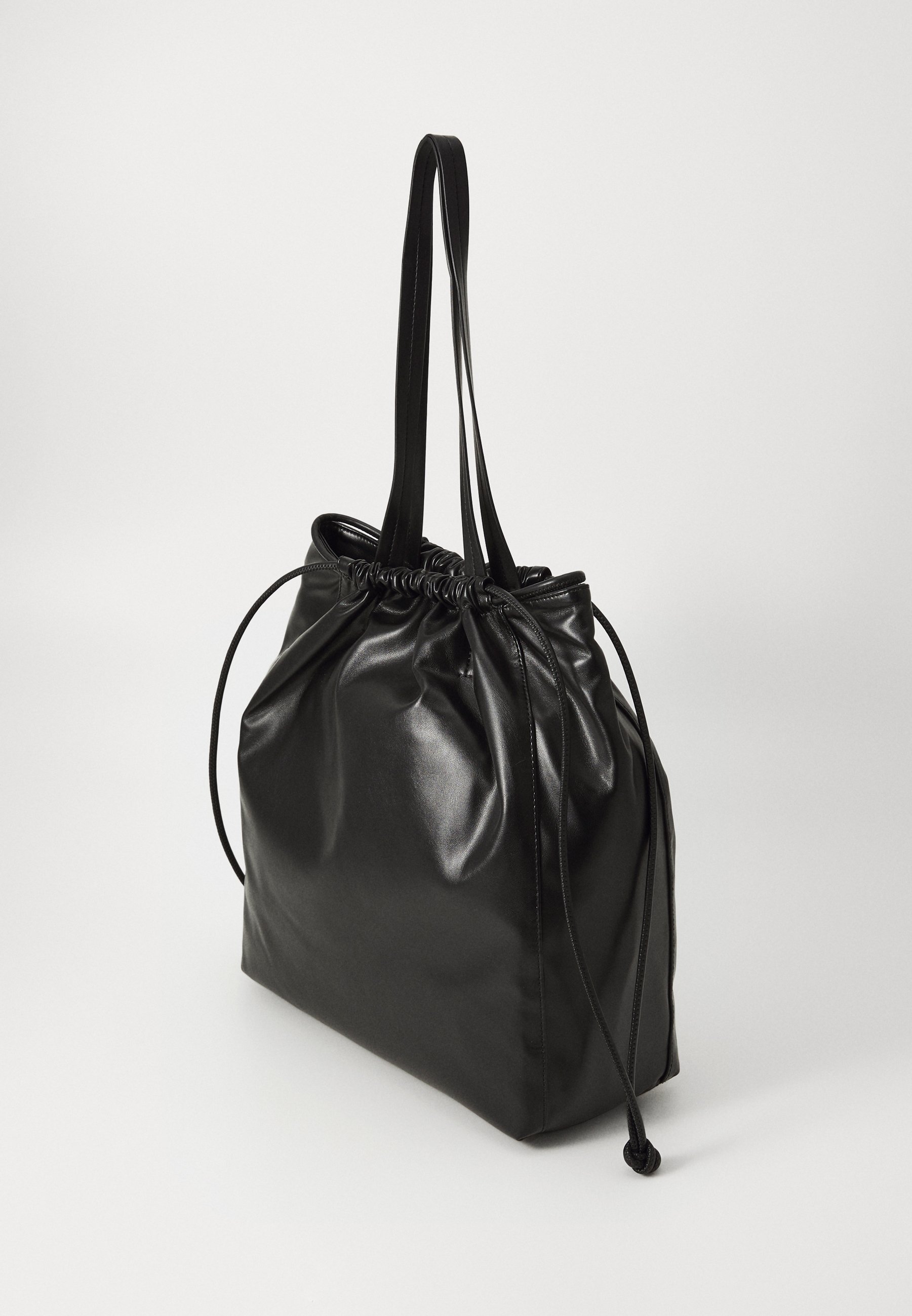 Calvin Klein Jeans DRAWSTRING TOTE - Tote bag - black