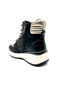 XTI Botines de tacón - black black