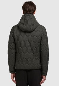 Dark green puffer jacket with a hexagonal quilted pattern, featuring a hood and elasticized cuffs, viewed from the back.