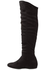 Botas de ante negro hasta la rodilla con suela plana, textura suave y silueta ajustada, que presentan sutiles ondas horizontales a lo largo del eje.