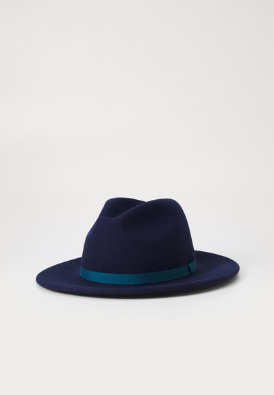 Navy felt hat with a wide brim and a teal satin ribbon around the base. The crown features a soft, creased design.