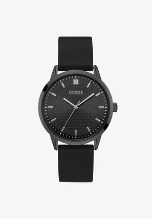 Čierne hodinky Guess s textúrovaným okrúhlym ciferníkom, striebornými hodinovými značkami, tromi ručičkami a jedným kryštálom na pozícii 12 hodín, čierny silikónový remienok.